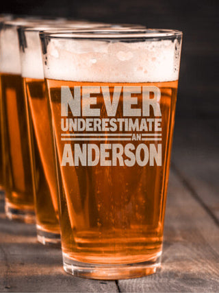 Never Underestimate : Pint Glasses - Engraved