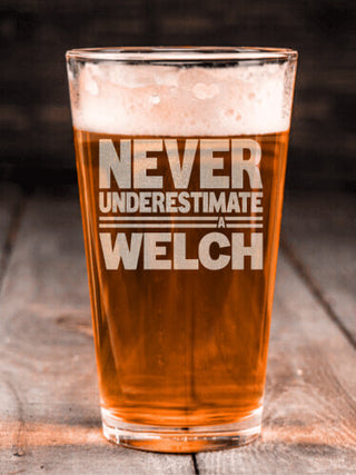 Never Underestimate : Pint Glasses - Engraved