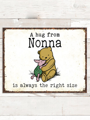 A Hug NA Tin Sign 16 x 12.5