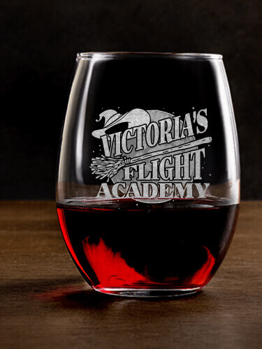 A624 Flight Academy - Stemless wine glass with personalized broomstick flight academny design on wooden table.
