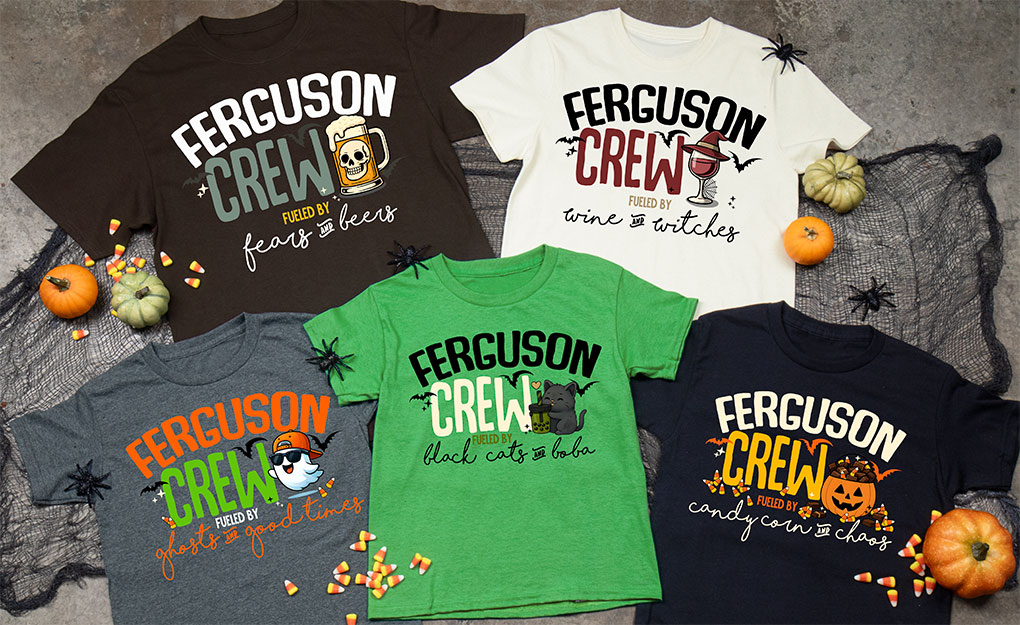 Five T shirts with our cute and quirky Halloween Crew designs in a fun holiday flat lay.