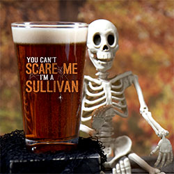 A color printed pint glass with a Halloween design