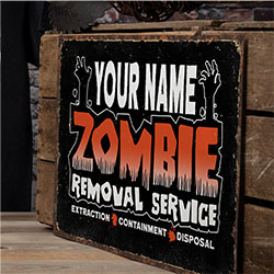 A Halloween themed antique style tin sign