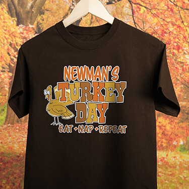 A405 Turkey Day - Your Name Turkey Day, Eat, Nap, Repeat, next to a cartoon turkey on a brown T-shirt.