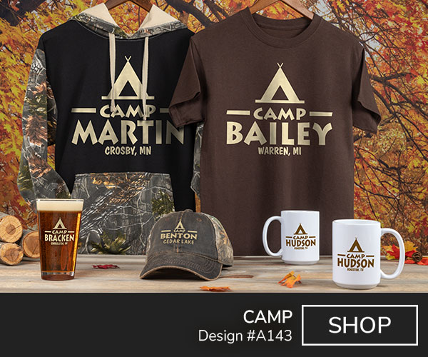 A143 | Camp - An A-frame tent above Camp, Your Name, above Your Location on a two tone camo hoodie, brown, T shirt, two tone camo embroidered hat, color printed coffee mugs, and color printed pint glass.