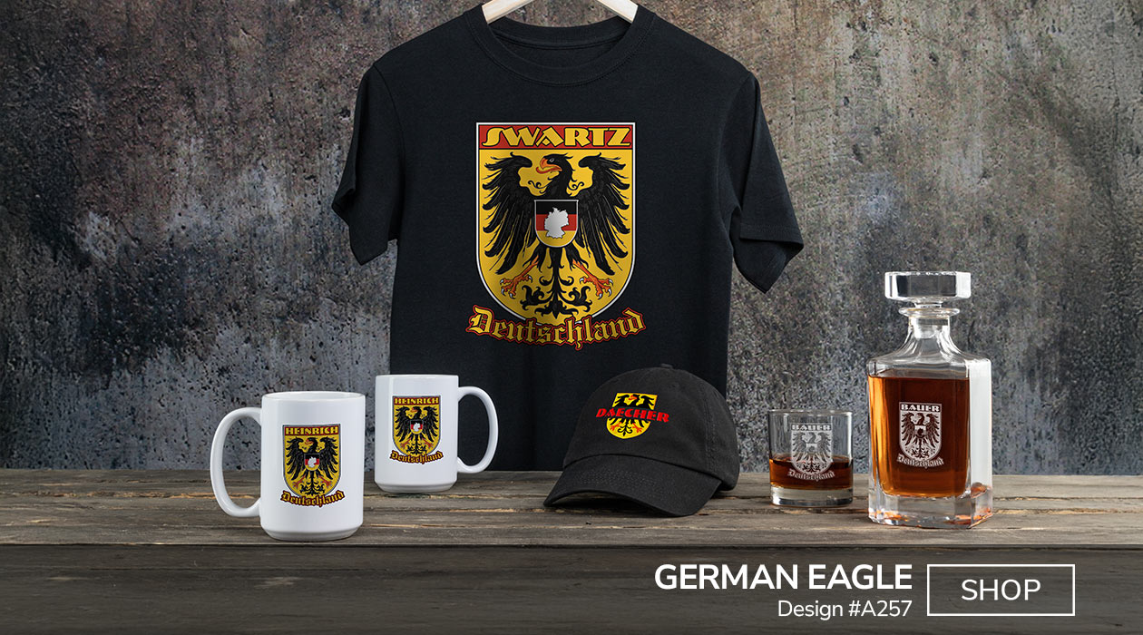 Design #A257 | German Eagle - Your Name over the official German coat of arms eagle, with a centered shield in German flag colors and an outline of Germany, above Deutschland, on a black T shirt, embroidered black baseball hat, color printed coffee mugs, engraved whiskey decanter, and engraved rocks glass.