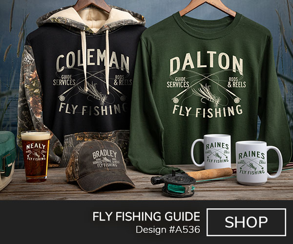 Design #A536 | Fly Fishing Guide - Your Name Fly Fishing, Guide Services, Rods and Reels, around two fly rods and a hand tied fly, on a 2 tone camo hoodie, forest green long sleeve T shirt, color printed pint glass, 2 tone camo hat, and ceramic coffee mugs.
