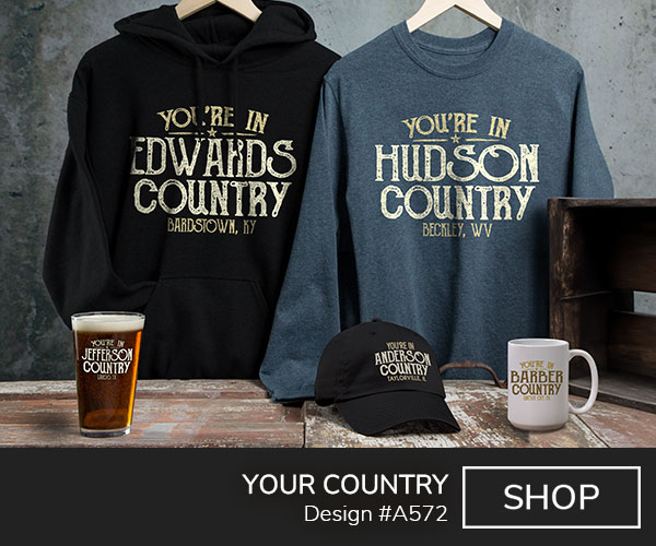 A572 | Your Country - You're In Your Name Country, Your Location, on a black hoodie, dark heather long sleeve tee, black baseball hat, color printed pint glass, and a ceramic coffee mug.