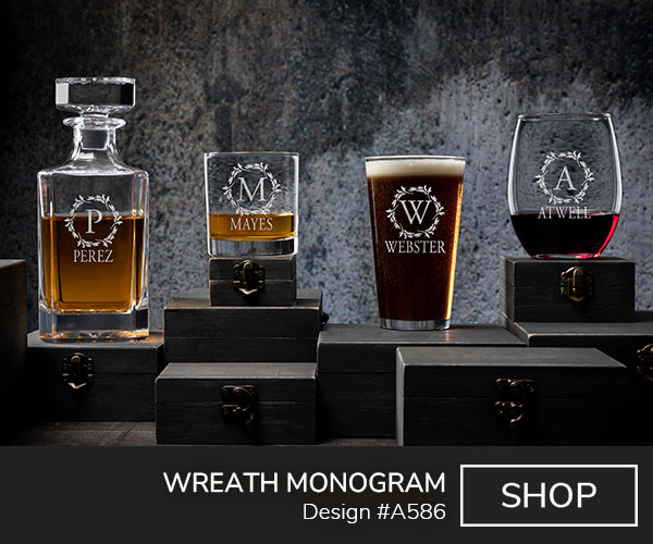A586 | Wreath Monogram - Monogram inside an elegant wreath above Your Name on an engraved decanter, rocks glass, pint glass, and wine glass.