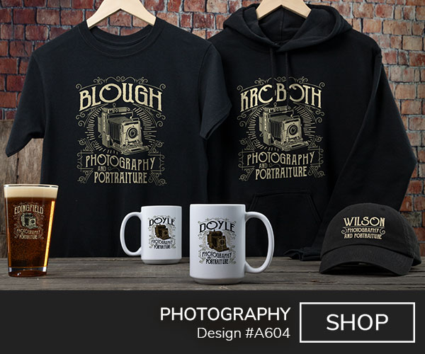 A604 | Photography - Your Name Photography And Portraiture in an art deco font and design around a vintage camera on black T shirt, black hooded sweatshirt, color printed pint glass, ceramic coffee mugs, and black embroidered baseball hat.