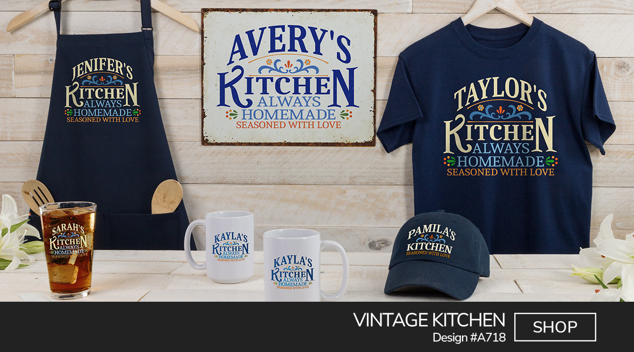 A718 | Vintage Kitchen - Your Name Kitchen, Always Homemade, Seasoned With Love, in an Americana style, on a navy blue tee, navy apron, tin sign, color printed pint glass, and ceramic coffee mugs.