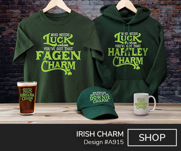 A915 | Irish Charm - Who Needs Luck When You've Got That Your Name Charm, punctuated with a little shamrock, on a forest green hoodie, T shirt, embroidered baseball hat, ceramic coffee mug, and color printed pint glass.